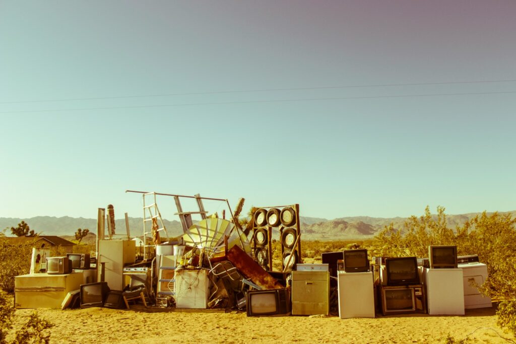 home appliance in the middle of the desert during daytime